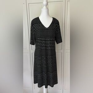 Chicos, almost new summer dress with elbow length sleeves, hits the knees.